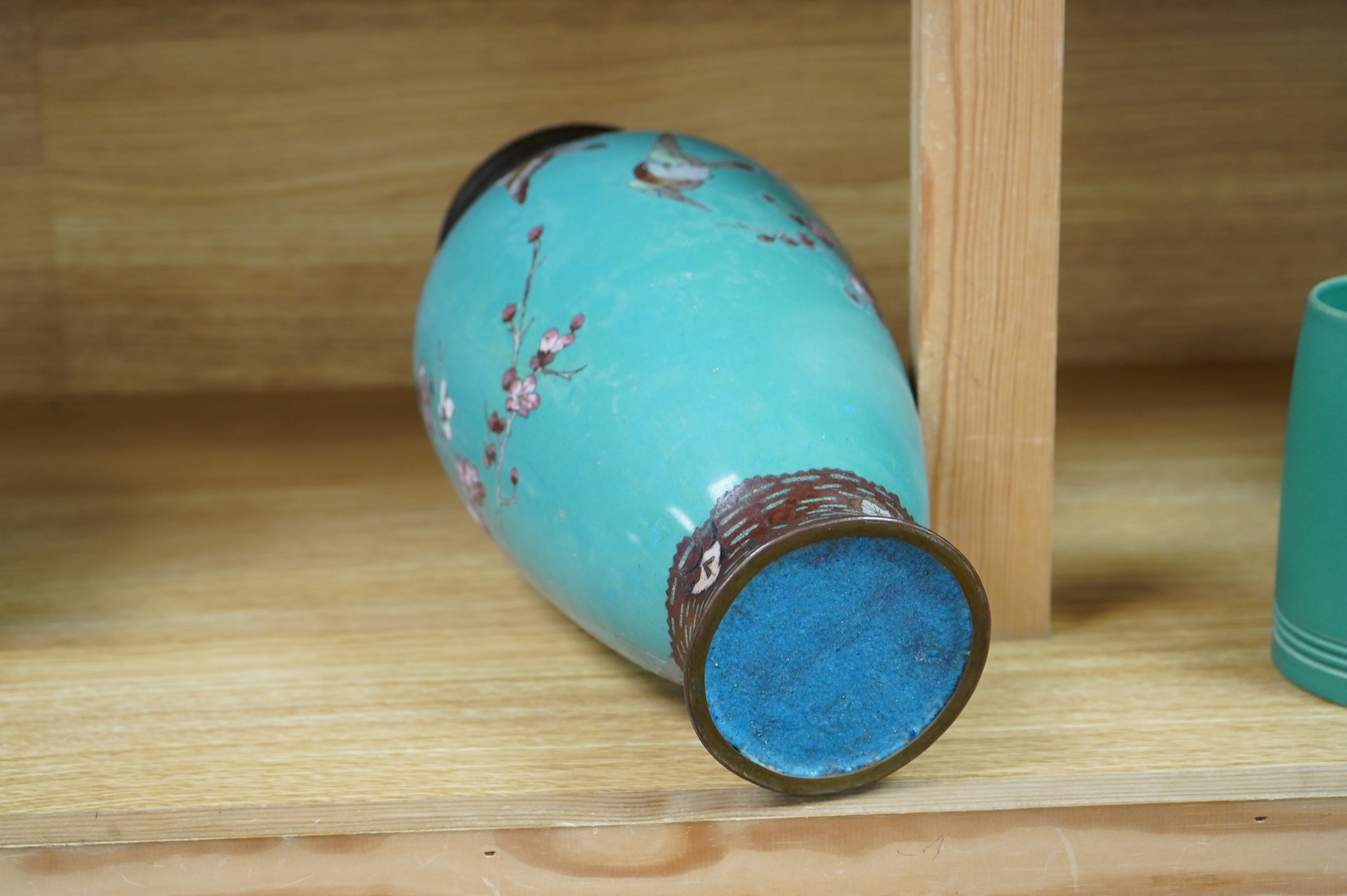 A Japanese cloisonne vase enamelled with birds amongst blossom, 31cm high